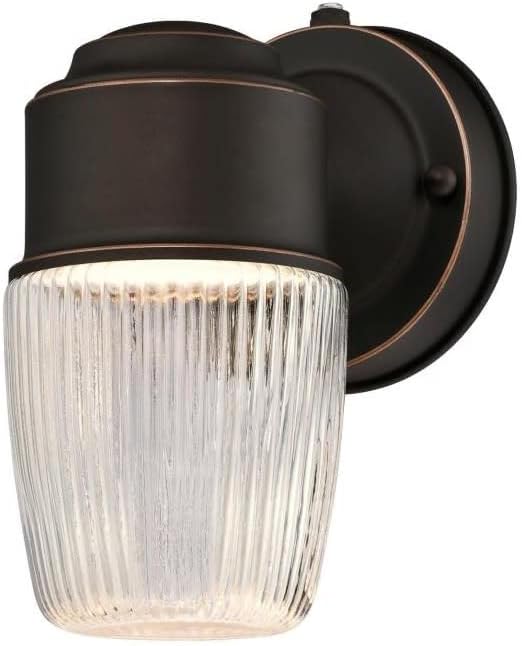 Westinghouse 6106900 One-Light LED Outdoor Wall Fixture with Dusk to Dawn Sensor Oil Rubbed Bronze Finish with Clear Ribbed Glass  Oil-rubbed Bronze