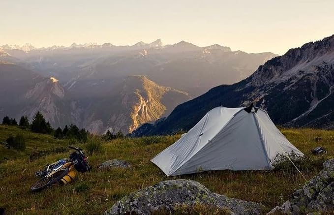 Six Moon Designs Lunar Duo Outfitter 2 Person Ultralight Backpacking Tent. 57 oz Gray. This Hiking or Backpacking Tent Provides Unsurpassed Space Comfort and Durability at The Perfect Price.