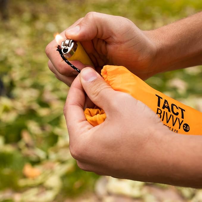 Survival Frog Tact Bivvy 2.0 Emergency Sleeping Bag with Stuff Sack Carabiner &amp Survival Whistle – Compact Lightweight Waterproof Reusable Thermal Bivy Sack Shelter Kit