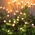 Solar Garden Lights Outdoor 4 Pack 32LED Swaying Light Waterproof Solar Lights Outdoor for Yard Pathway Patio Swaying Lawn Decor as Gardening Gifts for Women Holiday