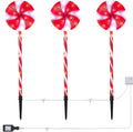 Alpine Corporation 28 Tall Outdoor Christmas Candy Cane Pathway Stake Lights with Multi-FunctionLED Set of 3 Festive Lawn and Garden Holiday Decor Red and White