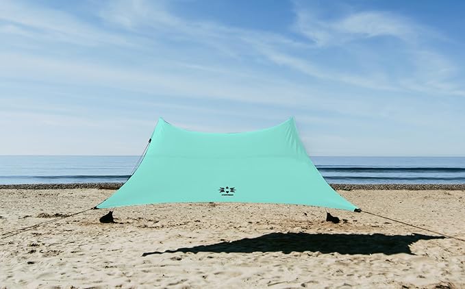 Neso Gigante Portable Beach Tent Sun Shelter - Lightweight Beach Shade Canopy - Easy Setup for Family Outings - Patented Reinforced Corners - UPF 50+ Sun Protection - 8ft Tall 11 x 11ft - Seafoam