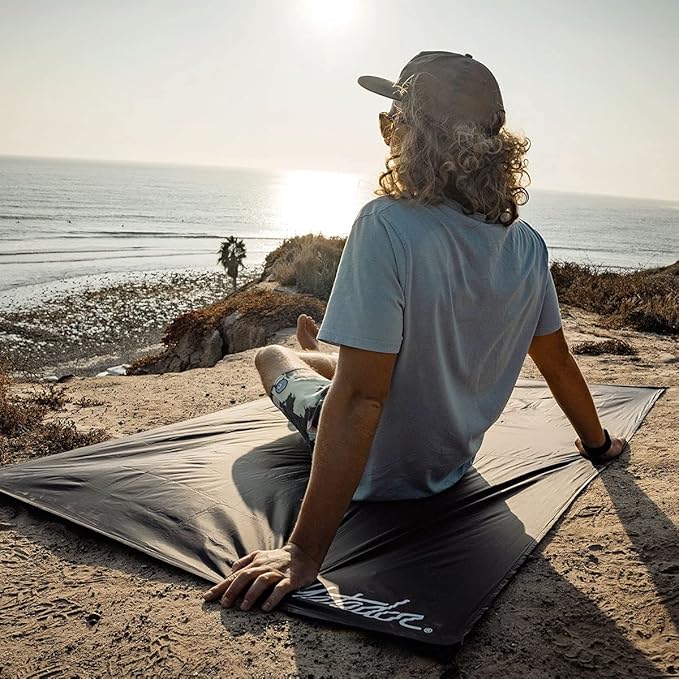 Matador Pocket Blanket - Black (Seats 2-4) Foldable Picnic Blanket Concert Blanket and Festival Blanket Sand Proof Beach Blanket with Stakes Picnic Tarp and Outdoor Blanket for Grass