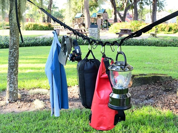 Campsite Storage Strap with 19 Separated Loops for Hanging Camping Equipment Gear and Supplies | Includes Carabiner Hooks and Clothes Pins | Durable Campground Organizer Holds up to 150 LBS