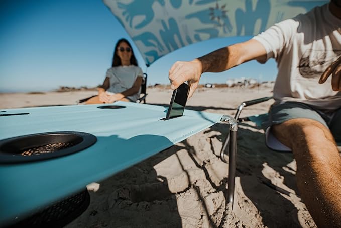 Neso Beach Table - Lightweight Portable and Foldable Table for Beach Camping and Outdoor Adventures - Stable Surface - with Cup Holder for Drinks and Phone Pockets - Seafoam