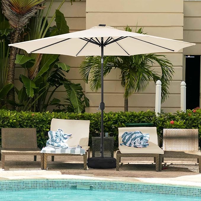 Sundale Outdoor Olefin 5-Year-Non-Fading Solar 104 LED 11FT Solar Patio Umbrella with Sand Bag Base Outdoor Umbrella with Tilt and Crank Beige