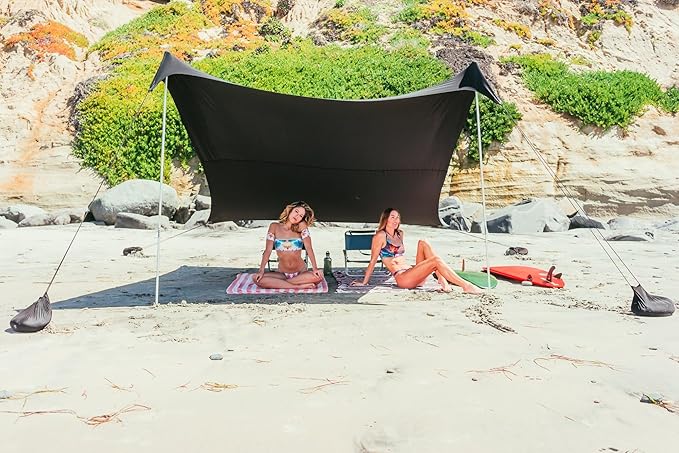 Neso Grande Portable Beach Tent Sun Shelter - Lightweight Beach Shade Canopy - Easy Setup for Family Outings - Patented Reinforced Corners - UPF 50+ Sun Protection - 7ft Tall 9 x 9ft