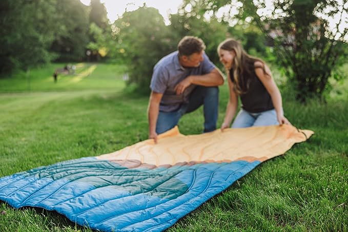 Picnic TIME Aura Outdoor Puffer Blanket Water-Repellent Puffy Printed Picnic Blanket for Camping and Park Large Cozy Outdoor Mat with Drawstring Bag Corner Loops and Pocket (Sunrise Mountain)