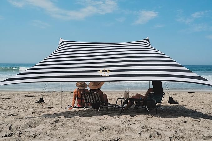 Neso Grande Portable Beach Tent Sun Shelter - Lightweight Beach Shade Canopy - Easy Setup for Family Outings - Patented Reinforced Corners - UPF 50+ Sun Protection - 7ft Tall 9 x 9ft