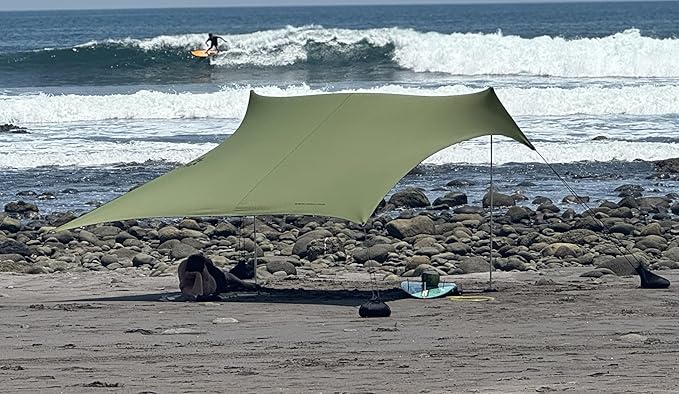 Neso Grande Portable Beach Tent Sun Shelter - Lightweight Beach Shade Canopy - Easy Setup for Family Outings - Patented Reinforced Corners - UPF 50+ Sun Protection - 7ft Tall 9 x 9ft