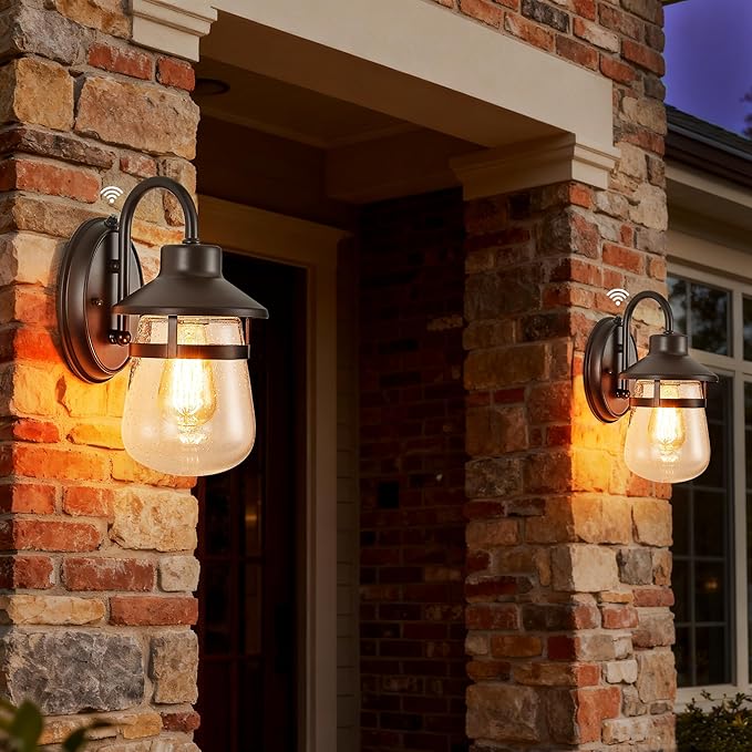 Updated Dusk to Dawn 1-Light Outdoor Wall SconceWaterproof &amp Rust-Proof and Sturdy Metal Lamp Body in Oil Rubbed Bronze Fully Sealed Clear Seeded Glass ShadeBulb Not Included