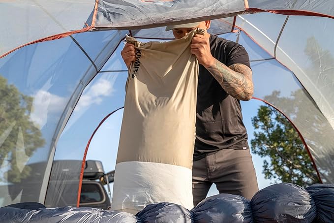 KLYMIT Drift Camping Pillow | Lightweight Travel Head Rest for Sleep Filled with Shredded Memory Foam Reversible Outer Cover for Extended Use Regular Size — Tan