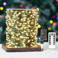 Fairy Lights Plug in200FT 600LEDs Waterproof Led String Lights8 Modes Remote Twinkle Light for Outdoor Indoor Christmas Wedding Birthday Garden Party DecorationsGreen WireWarm White