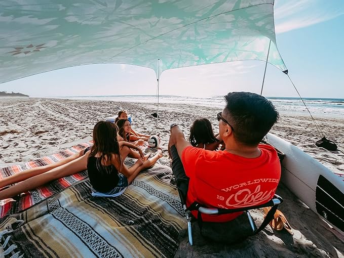 Neso Grande Portable Beach Tent Sun Shelter - Lightweight Beach Shade Canopy - Easy Setup for Family Outings - Patented Reinforced Corners - UPF 50+ Sun Protection - 7ft Tall 9 x 9ft