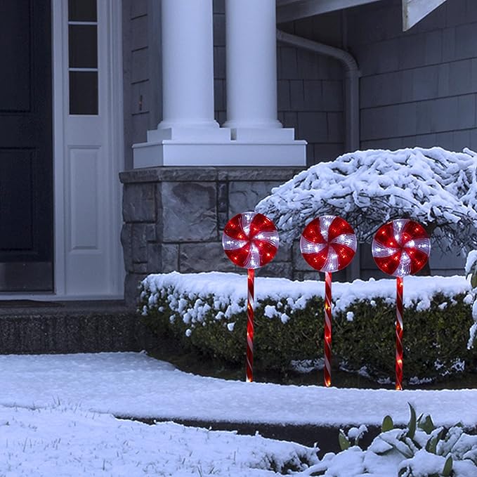 Alpine Corporation 28 Tall Outdoor Christmas Candy Cane Pathway Stake Lights with Multi-FunctionLED Set of 3 Festive Lawn and Garden Holiday Decor Red and White