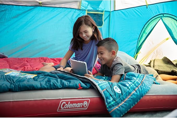 Coleman Kids 50°F Sleeping Bag Comfortable Youth Sleeping Bag for Sleepovers &amp Camping Fits Children up to 5ft Tall Glow in The Dark Design Stuff Sack Included Machine Washable
