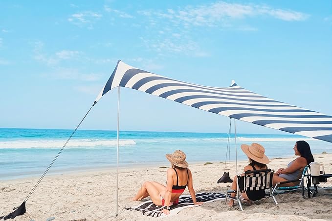 Neso Grande Portable Beach Tent Sun Shelter - Lightweight Beach Shade Canopy - Easy Setup for Family Outings - Patented Reinforced Corners - UPF 50+ Sun Protection - 7ft Tall 9 x 9ft