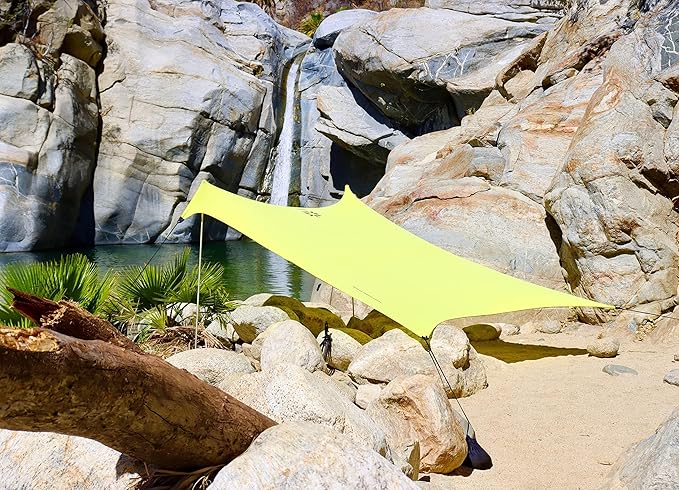 Neso Grande Portable Beach Tent Sun Shelter - Lightweight Beach Shade Canopy - Easy Setup for Family Outings - Patented Reinforced Corners - UPF 50+ Sun Protection - 7ft Tall 9 x 9ft