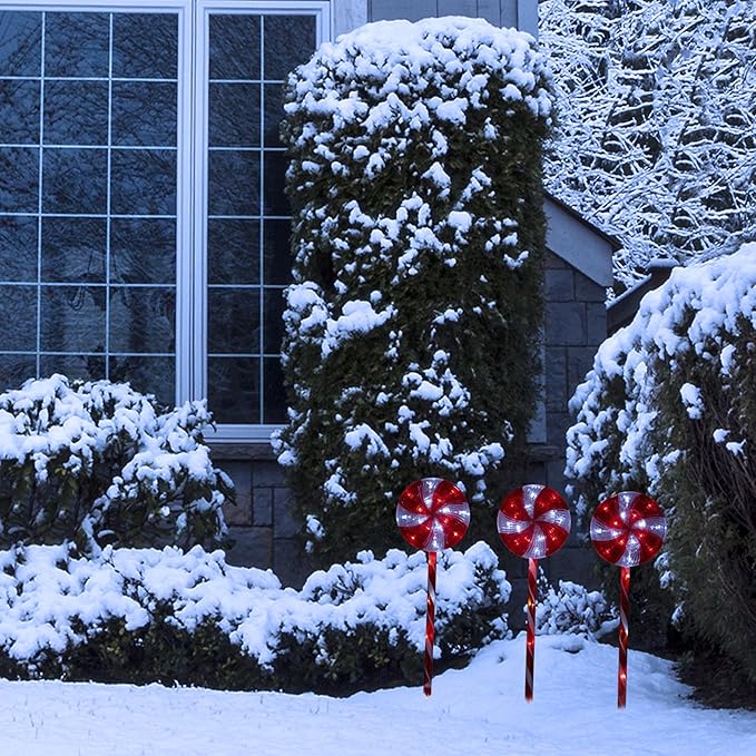 Alpine Corporation 28 Tall Outdoor Christmas Candy Cane Pathway Stake Lights with Multi-FunctionLED Set of 3 Festive Lawn and Garden Holiday Decor Red and White