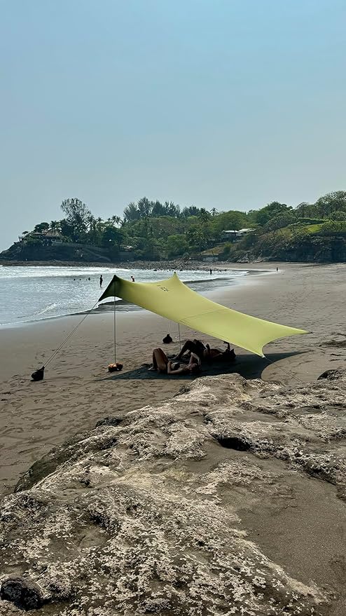 Neso Grande Portable Beach Tent Sun Shelter - Lightweight Beach Shade Canopy - Easy Setup for Family Outings - Patented Reinforced Corners - UPF 50+ Sun Protection - 7ft Tall 9 x 9ft