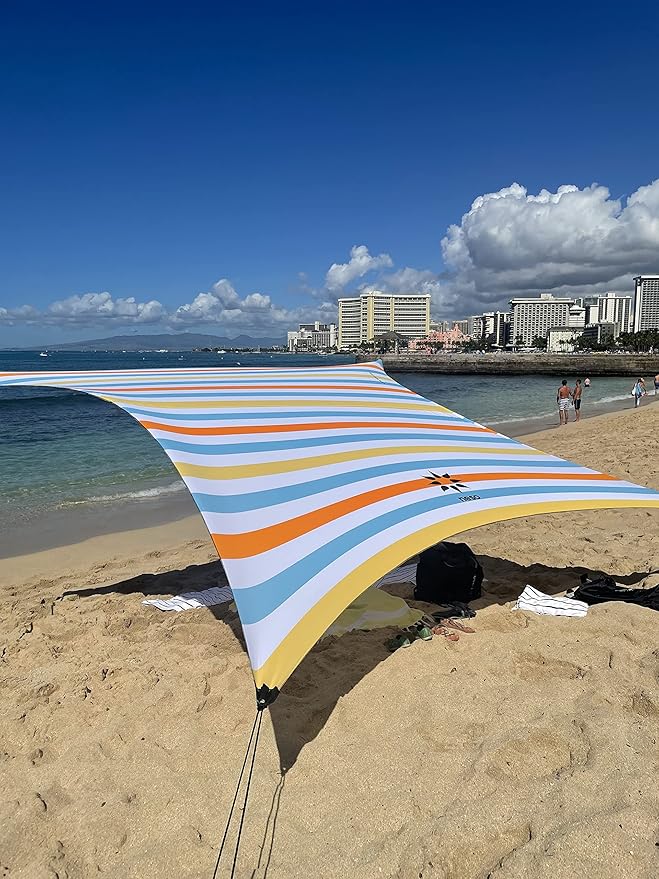 Neso Grande Portable Beach Tent Sun Shelter - Lightweight Beach Shade Canopy - Easy Setup for Family Outings - Patented Reinforced Corners - UPF 50+ Sun Protection - 7ft Tall 9 x 9ft