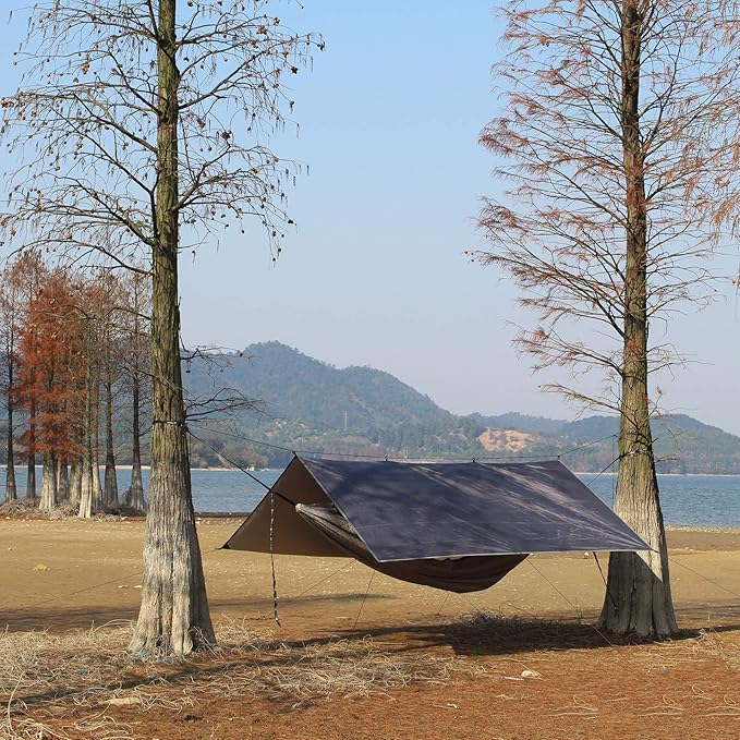 Hammock Rain Fly Tent Tarp Provides Effective Protection Against Rain Snow. 32ft Long Ridgeline. Big 9.8x9.5ft Durable Waterproof 210D Oxford. 6 Reflective Guy Lines 2 Stuff Sacks. Easy Assembly