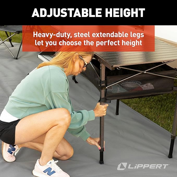 Lippert Camping Dining Table Slatted Aluminum Tabletop Foldable Design Heavy-Duty Steel Legs Powder-Coated Protection Mesh Storage Shelf 80-lb. Capacity Carrying Bag - 2022122524